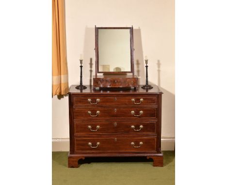 A George III mahogany chest of drawers, circa 1780, the rectangular top with moulded edge, above four long graduated drawers,
