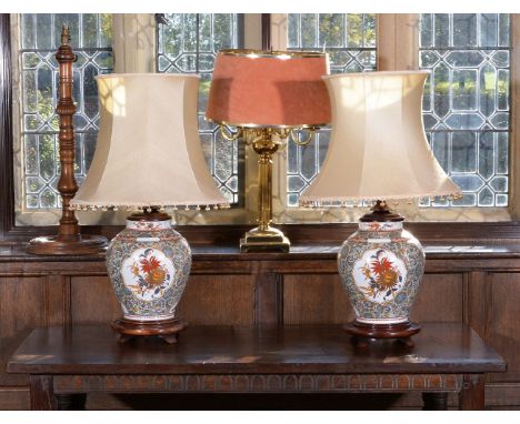 A pair of Limoges porcelain table lamps in Oriental taste, modern, of baluster form, with floral motifs in cartouches and pol
