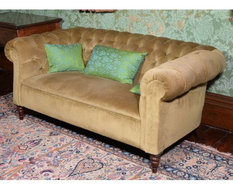 A mahogany and button upholstered sofa, in Victorian style, 20th century, 74cm high, 160cm wide, 72cm deep