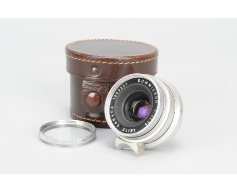 A Leitz Canada Summicron 35mm f/2 Lens, serial no. 1652221, 1959, Leica screw mount, barrel F, elements F, haze and dust, wit