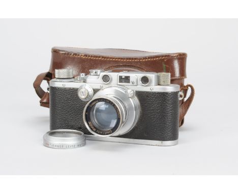 A Leica IIIa Camera, serial no. 316156, 1939, shutter working, body F-G, age-related wear, with a Leitz Summar 5cm f/2 collap