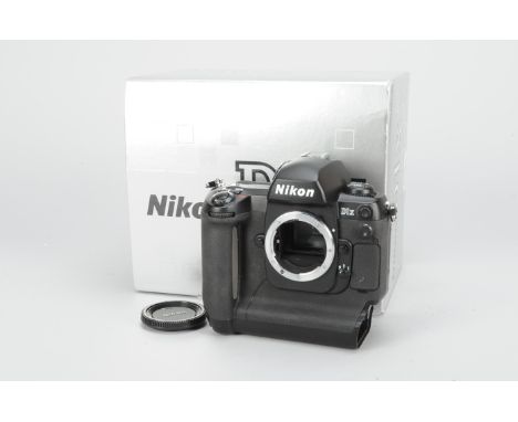 A Nikon DIx DSLR Camera Body, in maker's box, with manual, strap, cables, body G, light scratches to screen, wear to grip, no