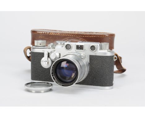 A Leica IIIc Camera serial no. 497013, 1950, shutter working, self-timer working, crinkling in shutter blind, body G, slight 