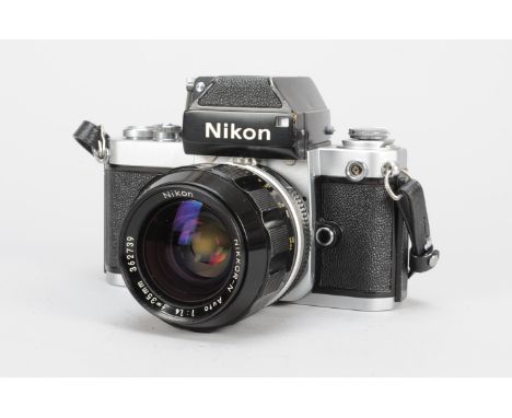 A Nikon F2 Photomic SLR  Camera, chrome, serial no 7118767, with Nikkor-N 35mm f/1.4 lens, serial no 362739, shutter working,