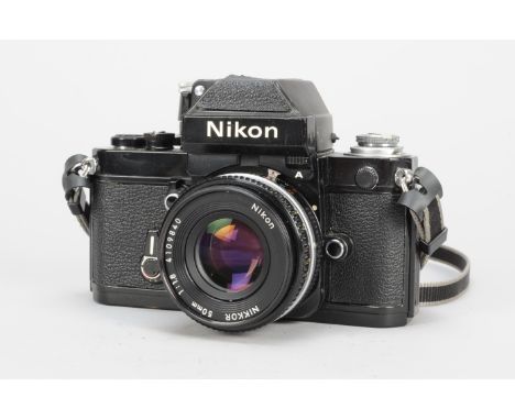 A Nikon F2 A SLR Photomic Camera, black, serial no 7731590, shutter working, timer working, body G, some brassing to top plat