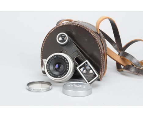 A Leitz Summaron 3.5cm f/3.5 Lens with 'Spectacles', serial no. 1677964, 1959, Leica M bayonet, with supplementary ocular att