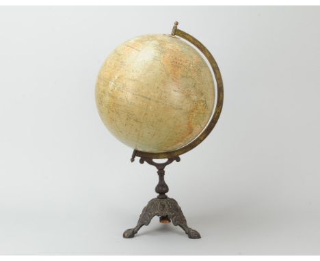 A Phillips' New Physical Terrestrial Globe, 14in diam., on decorative cast iron tripod stand, circa 1910, 830mm high, P-F, so