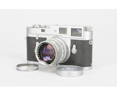 A Leica M2 Camera,  chrome, serial no. 1019382, 1961, self-timer, lever rewind release, shutter working, body P-F, corrosion 