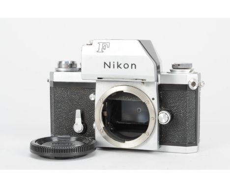 A Nikon F Nippon Kogaku Tokyo Photomic Camera body, chrome, serial no 6736310, shutter working, timer working, body G-VG, som