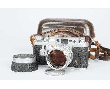 ANNOUNCE CAMERA SHUTTER IS WORKINGA Leica IIIg Camera, serial no. 887142, 1957, factory conversion from Ig, body F-G, nick in