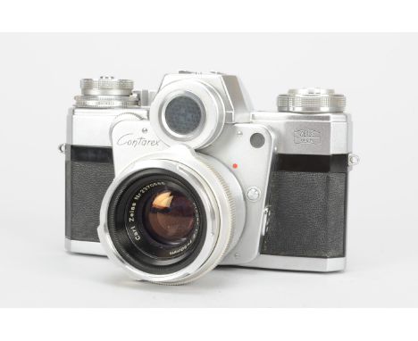 A Zeiss Ikon Contarex Bullseye  SLR Camera, chrome, serial no T 88704, shutter working, timer working, aperture wheel jammed,