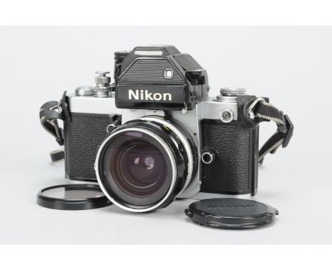 A Nikon F2 SLR Photomic Camera, chrome, serial no 7650310, shutter working, timer working, body G, some brassing, light scrat