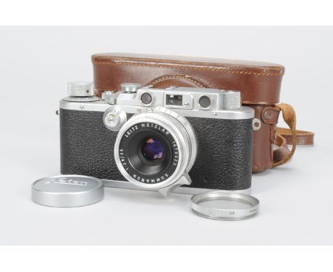 A Leica IIIa Camera, serial no. 307938, 1938, factory conversion from Leica Standard, shutter not working, film wind knob fre