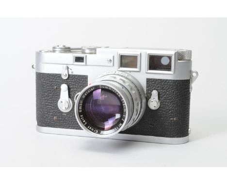 A Leica M3 Double Stroke Camera, chrome, serial no. 838205, 1956, self-timer and shutter working, body F, signs of use and ag