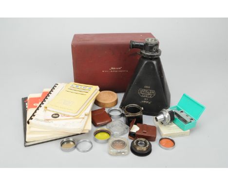 A Leitz Makam Microscope 9x12cm Plate Camera, with 2 plate holders, a dark slide, some Leitz filters, a Leica Darkroom Practi