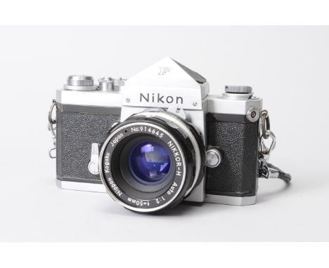 A Nikon F Nippon Kogaku Tokyo  Camera, chrome, serial no 6528721, shutter working,timer working, body G, slight lifting to le