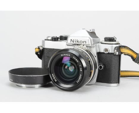 A Nikon FE SLR Camera, chrome, serial no 4081972, shutter working on M90 setting, untested othewise, timer working, body G-VG