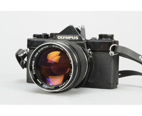 An Olympus OM-1 SLR Camera, black, with G Zuiko 55mm f/1.2 auto-s lens, shutter working, timer working, meter untested, body 