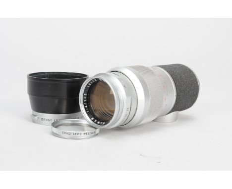 A Leitz Elmar 135mm f/4 Lens, serial no. 1824771, 1960, Leica screw mount, barrel G, elements F-G, light dust, with maker's r