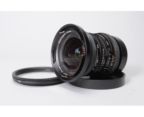 A Hasselblad Carl Zeiss CF 40mm f/4 T* Distagon Lens, serial no 6891618, barrel, G-VG, light marks, elements G, internal dust