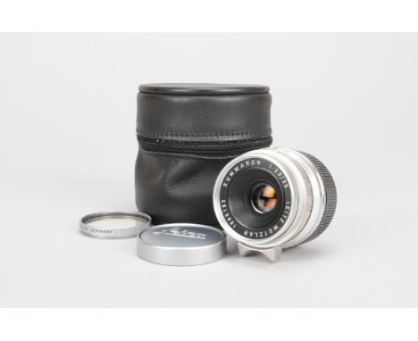 A Leitz Summaron 35mm f/2.8 Lens, chrome, serial no. 1905193, 1961, barrel G, elements F-G, slight marks, with maker's caps a