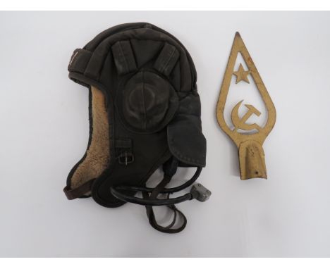 Russian Tank Driver’s Helmet and Flagpole Topblack canvas helmet with padded crown ribs.  Side ear flaps with electrical earp