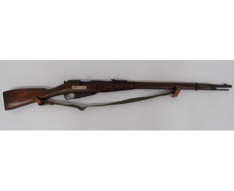 Deactivated Russian 1891/30 Rifle7.62mm, blued barrel.  Rear ladder sight.  Blued breech with maker’s details.  Straight bolt