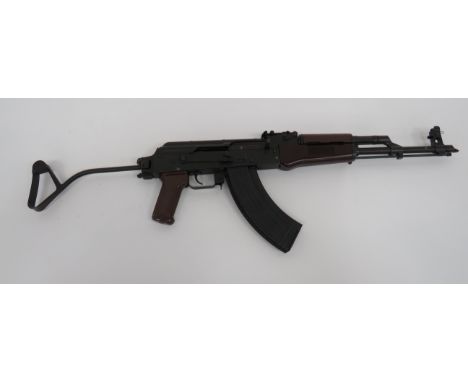 Deactivated East German MPIAKS-74 (AK47) Assault Rifleblued barrel with tall hooded front sight.  Top mounted gas port.  Rear