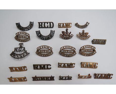 Selection of Shoulder Titlesbrass examples include T4 Oxf &amp; Bucks with bugle ... T. RGA Wessex ... RCD ... RIR ... RMC ..