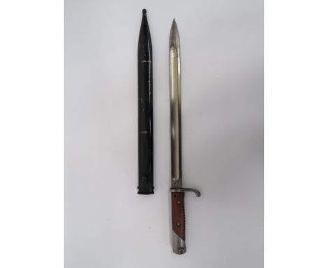 Scarce Imperial German “Machine Gunners” Bayonet14 1/2 inch, single edged blade with wide fuller.  The forte with maker’s sta