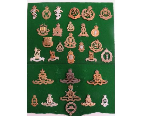 Selection of Corps Cap Badgesincluding KC brass Intelligence Corps ... KC brass Military Police ... Brass Army Educational Co