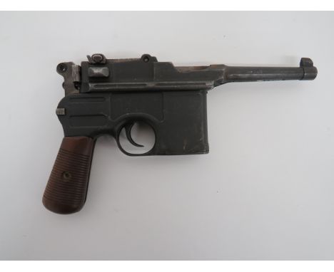 Deactivated C96 Mauser Small Ring Hammer Auto Pistol7.65 mm, blackened barrel with fixed front sight.  Blackened top body wit