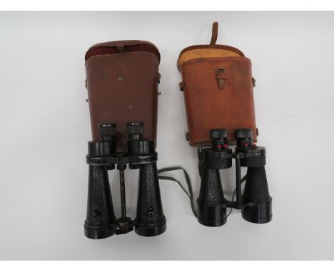 Two Pairs of British Naval Pattern Binocularsconsisting “Barr &amp; Stroud 7 x CF41” binoculars.  Blackened lenses.  Leather 