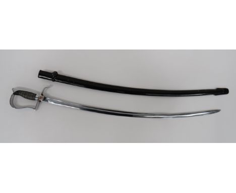 East German Officer’s Dress Sword33 inch, single edged, slightly curved blade.  Narrow fuller.  Nickel plated stirrup knuckle