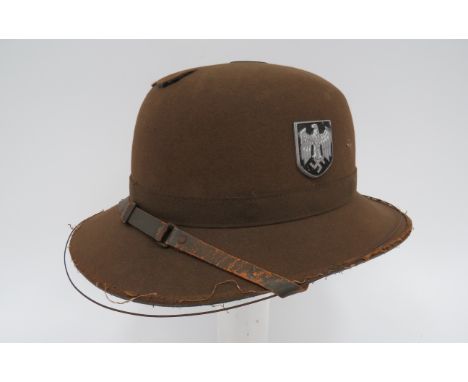 Third Reich German Africa Korps Tropical Pith Helmetkhaki green felt body, band and brim.  Left shield embossed with eagle an