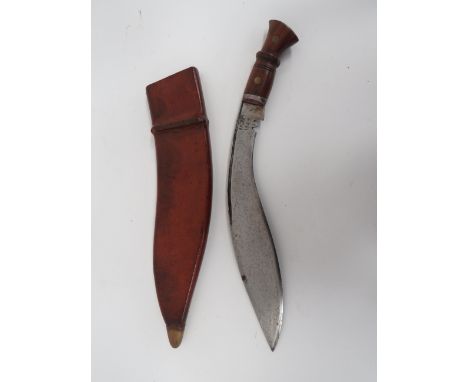 WW2 Dated Issue Indian Kukri13 3/4 inch, single edged blade of typical form. Narrow rear fuller. Blade stamped “V.A.D. 1941”.