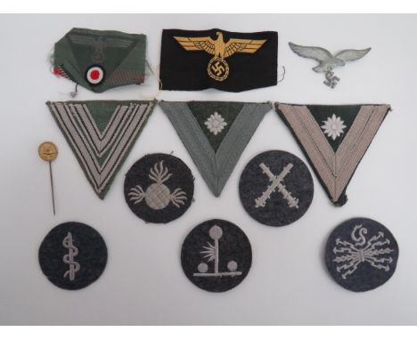 Small Selection of Third Reich German Badgesincluding bevo weave eagle, swastika and cockade triangle cap badge ... Bevo weav