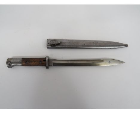 Imperial German Seitengewehr M84/98 Sawback Removed Bayonet9 3/4 inch, single edged blade.  Back edge showing where sawback h