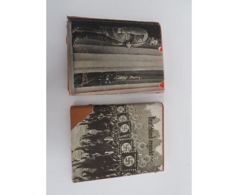 Two WW2 Third Reich German Photo Albumsconsisting “Adolf Hitler” with red linen cover in A4 size complete with dust cover and