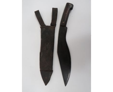 Interwar Dated Indian Made Kukri13 inch, single edged, blued blade of typical form. Blade stamped “MK1. 1927”. Simple plain w