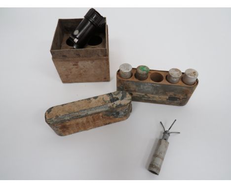 Selection of German Fusesconsisting brown Bakelite time fuse.  The screw off lid with concealed winding key.  Small glazed ti