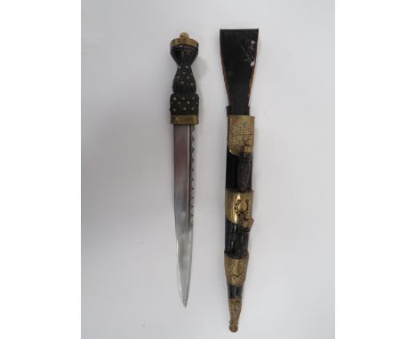 19th Century Scottish Dirk By “Lawrie”11 1/2 inch, single edged blade with narrow fuller and clipped back edge.  Blade with m