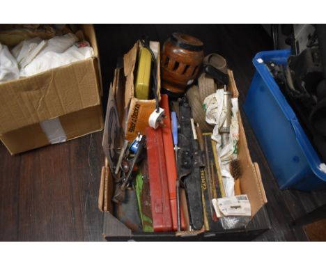 A mixed box of tools including jack, socket sets and more.
