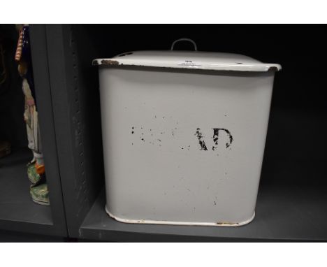 A vintage enamel kitchen bread bin