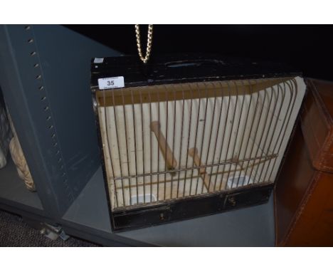 A vintage 1940's bird cage or budgerigar
