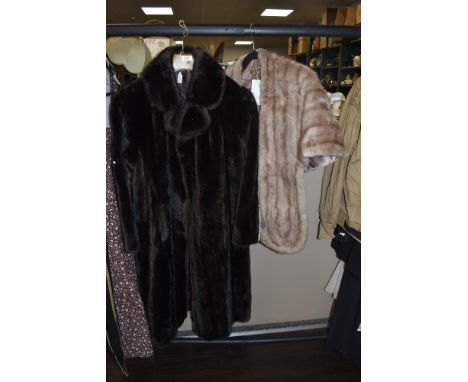 A faux fur coat and vintage stole.