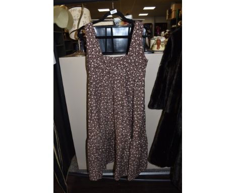 A vintage 1970s Laura Ashley dress.
Vintage size 12.