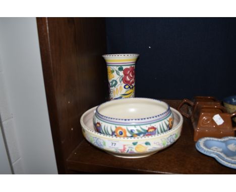 Three pieces of mid century design studio pottery by Poole a Vase a flower bowl and fruit bowl