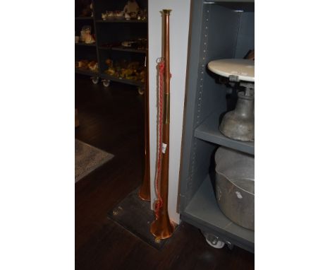 A vintage copper and brass hunting horn