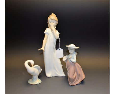 A Nao figure, of a yawning girl; another, of a flower girl; a Lladro model of a Goose (3)